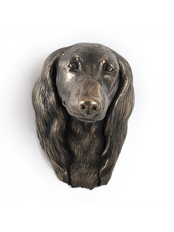 Tax långhårig-figurin brons