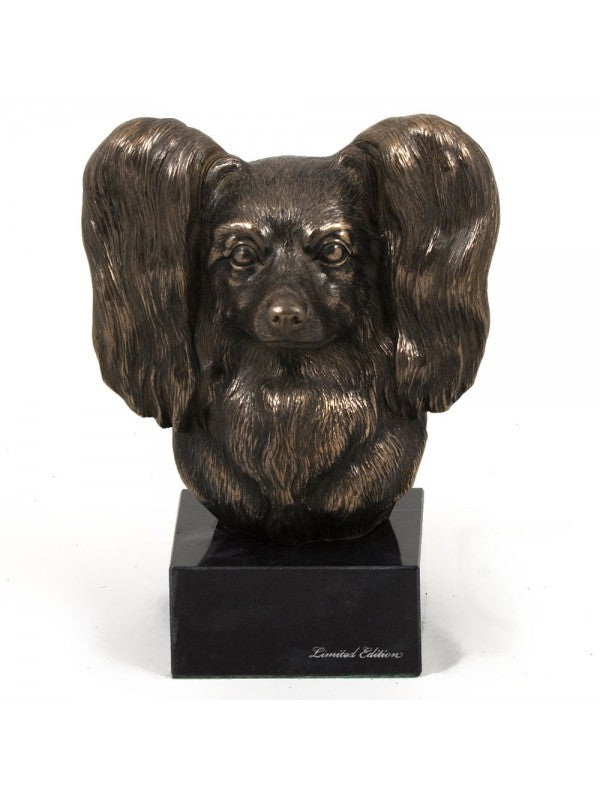 Papillon-figurin brons